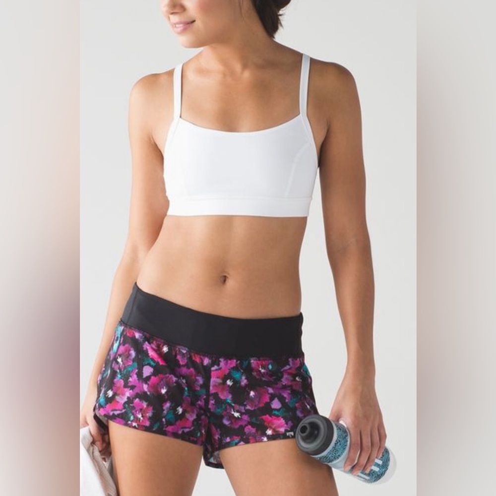 Lululemon speed short.  Midnight bloom, black, pink, fuchsia. Size 6-EUC.